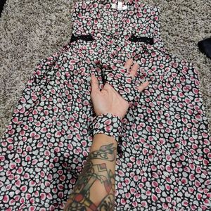 sleeveless sheer flowy button down shirt